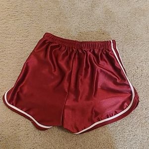 Burgandy dolphin shorts.
